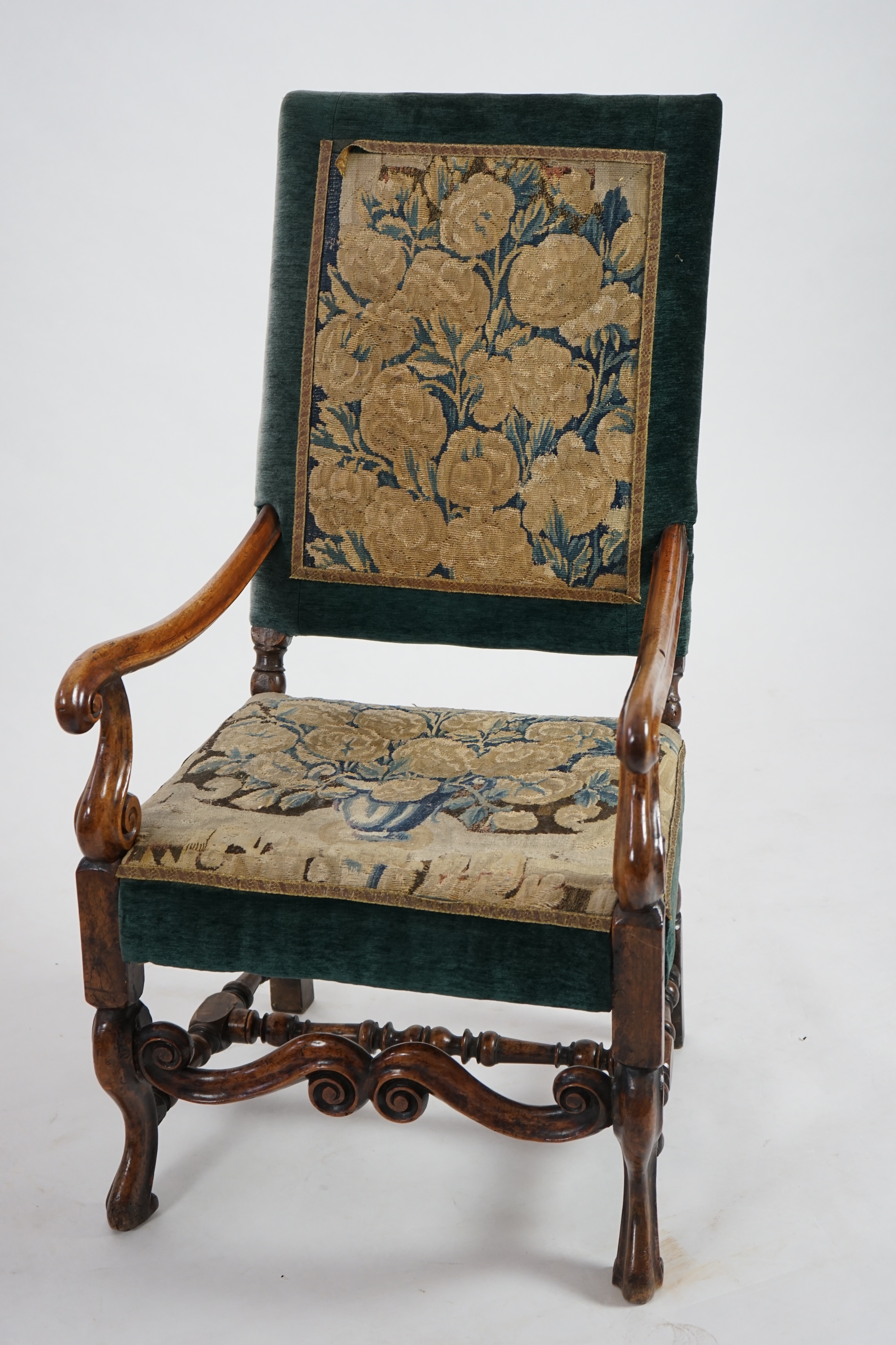 A Louis XV walnut fauteuil tapestry seated armchair